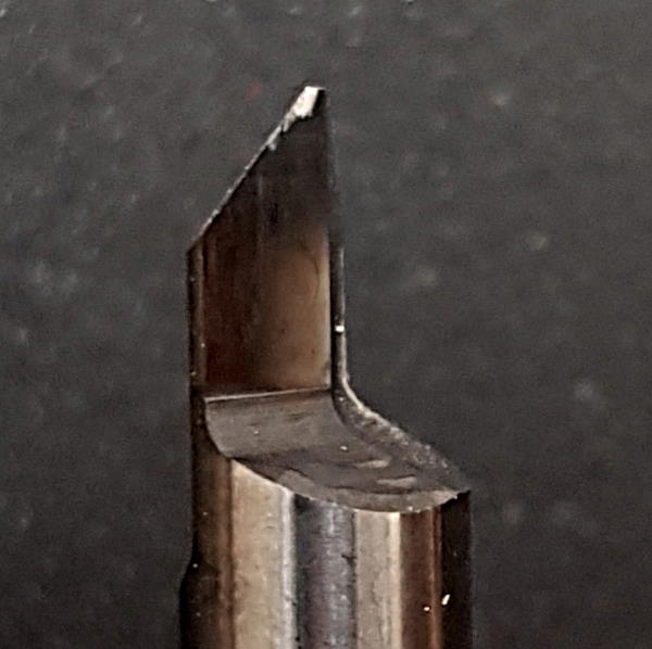 Image: 45° Front view of used V-cut bit