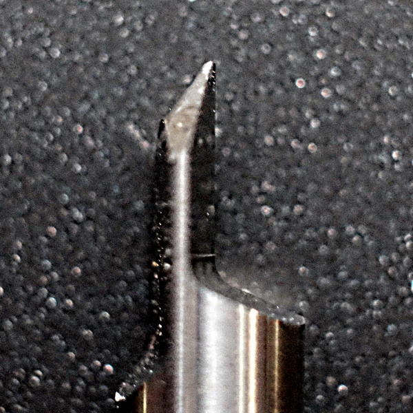 Image: Side view of used V-cut bit